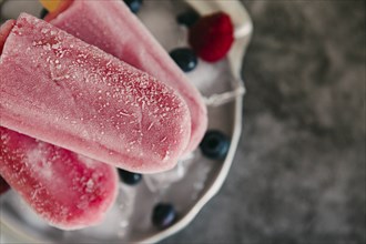 Berry ice pops with berries