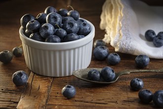 Ramekin of blueberries with spoon