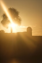 Silhouette of Castillo de San Marcos at sunset in St. Augustine