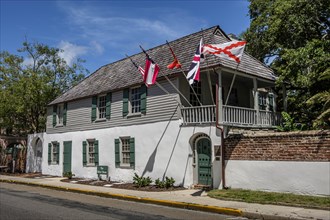 House with multiple flags in St. Augustine