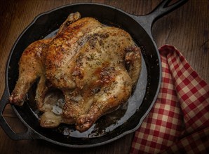 Roast chicken in frying pan