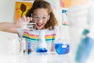 Girl making science experiment