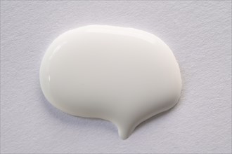 White paint in shape of speech bubble