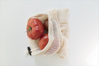 Tomatoes in reusable bag