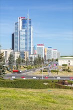 Park by modern office buildings in Minsk, Belarus