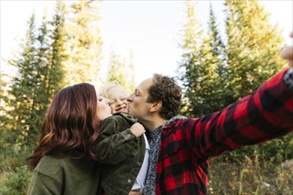 Family selfie in forest