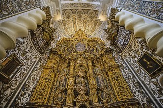 Ornate alter in Church of Saint Louis of France in Seville, Andalusia, Spain