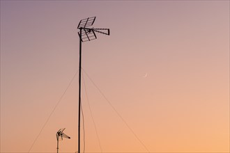 Silhouette of antenna at sunset in Seville, Andalusia, Spain