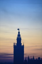 Silhouette of Giralda at sunrise in Seville, Andalusia, Spain