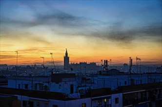 Cityscape with Seville Cathedral at sunrise in Seville, Andalusia, Spain