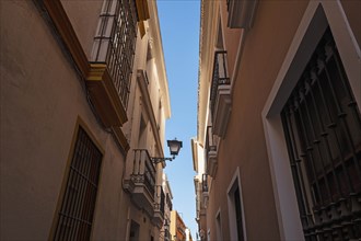 Low angle shot of townhouses in Seville, Andalusia, Spain