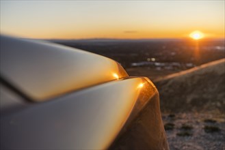 Car hood at Treasure Valley at sunset in Boise, Idaho, USA