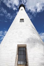 Low angle shot of white lighthouse against sky in Key Biscayne, Florida, USA