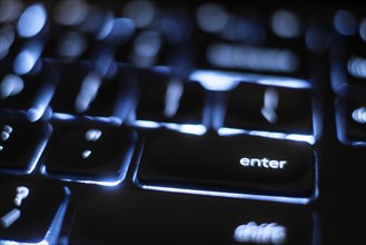 Illuminated 'enter' key on keyboard