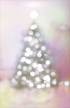 Christmas tree with lights in soft focus
