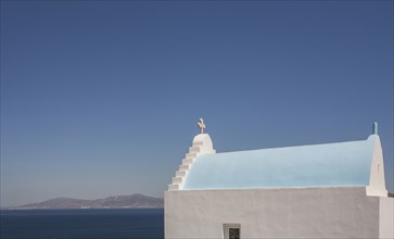 Roof of church by sea in Santorini, Greece