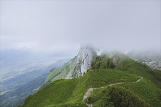 Mountain in fog in Appenzell, Switzerland