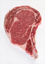 Raw steak on white background