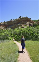 Woman hiking in Roxborough State Park, Colorado