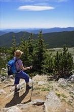 Woman looking at view in Mount Evans Recreational Area, Colorado