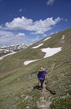 Woman hiking in mountains of Loveland Pass, Colorado