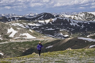 Woman hiking in mountains of Loveland Pass, Colorado