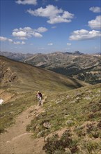 Woman hiking on Mount Flora in Colorado