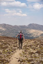 Woman hiking in Loveland Pass, Colorado