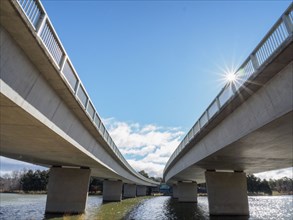 Low angle view of bridges under sunshine