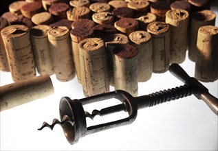 Corkscrew and collection of corks