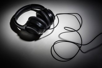 Headphones in shadow