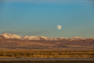 Moon over hills in Boise, Idaho