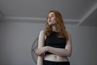 young woman in crop top