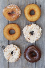 Donuts on wooden table