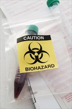 Blood sample with biohazard sign