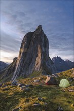 Norway, Senja, Two tents near Segla mountain at sunset