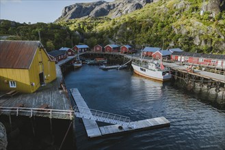 Norway, Lofoten Islands, Nusfjord, Dock in traditional fishing village