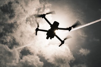 Drone flying in sky