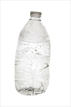 Wet plastic bottle on white background