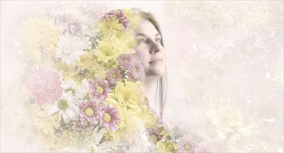Double exposure of woman and flowers