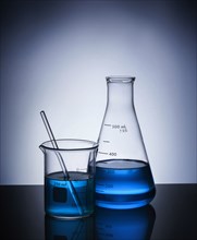 Blue liquid in beakers