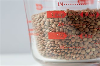 Lentils in measuring cup