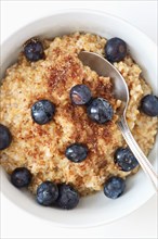 Oatmeal and blueberries in bowl