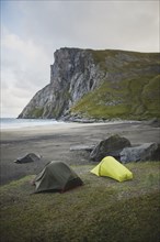 Tents on Kvalvika beach in Lofoten Islands, Norway