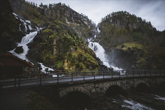 Road by Latefossen waterfall in Vestland, Norway