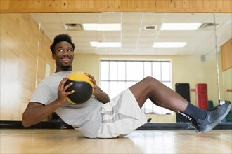 Man working out with medicine ball
