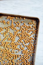 Roasted chickpeas on baking tray