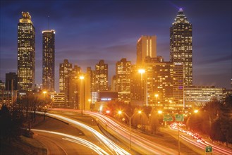 USA, Georgia,  AtlantaTraffic light trails in city at night