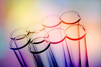 Studio shot of empty test tubes on colorful background