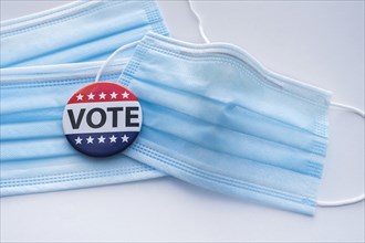 American Vote button on surgical masks